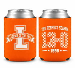 Keep it cold. Remember the season. Celebrate an unforgettable 13-0 run with The Perfect Season 1998 Can Cooler from Legends of the Fall. Featuring bold checkerboard-inspired 13-0 artwork and signature Legends of the Fall branding, this neoprene cooler is made for game days, tailgates, watch parties, and everyday use. Available in Tennessee Orange and Smokey Gray, with options designed to fit both regular and slim cans. Details: Neoprene construction • 1998 / 13-0 commemorative design • Legends of the Fall branding • Regular & slim can sizes • Tennessee Orange & Smokey Gray The Perfect Season. 13-0. 1998. The Legend Continues.™